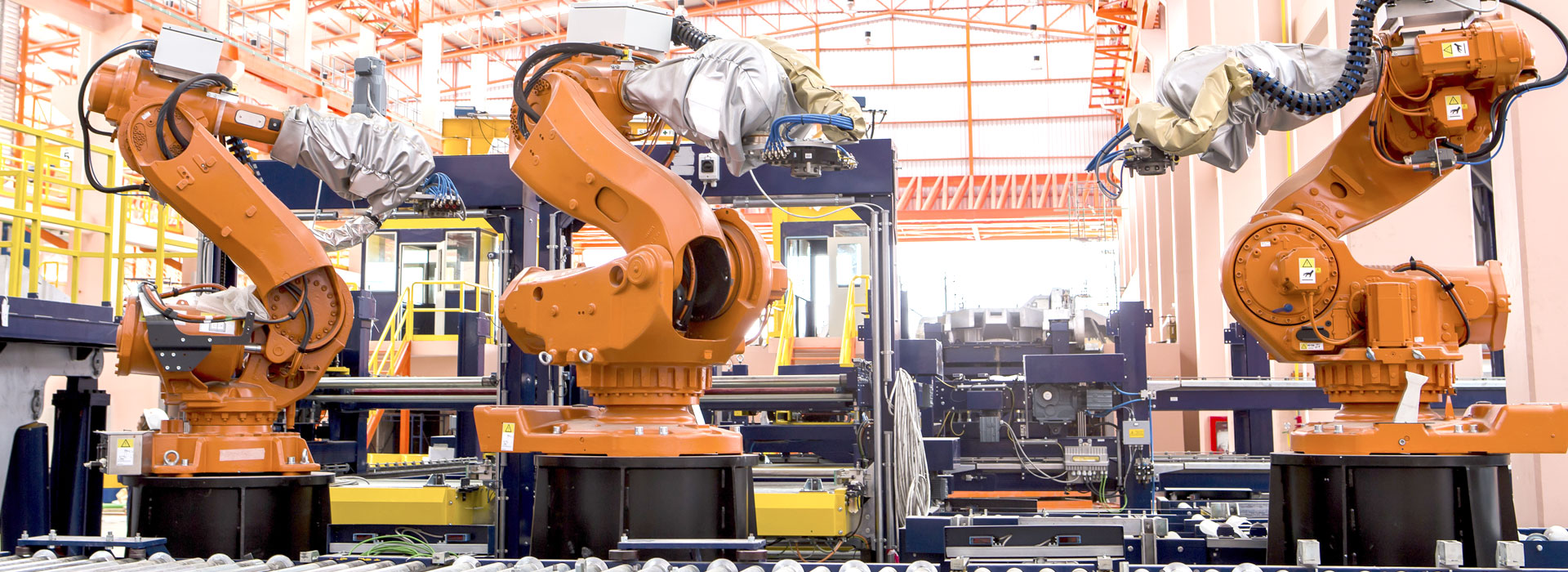 Robots Welding in a Production Line